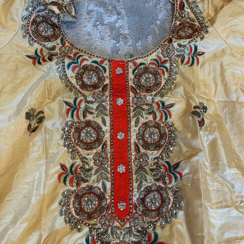 Beautiful cream and orange punjabi salwar suit